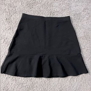 Loft black skirt with ruffle detail.